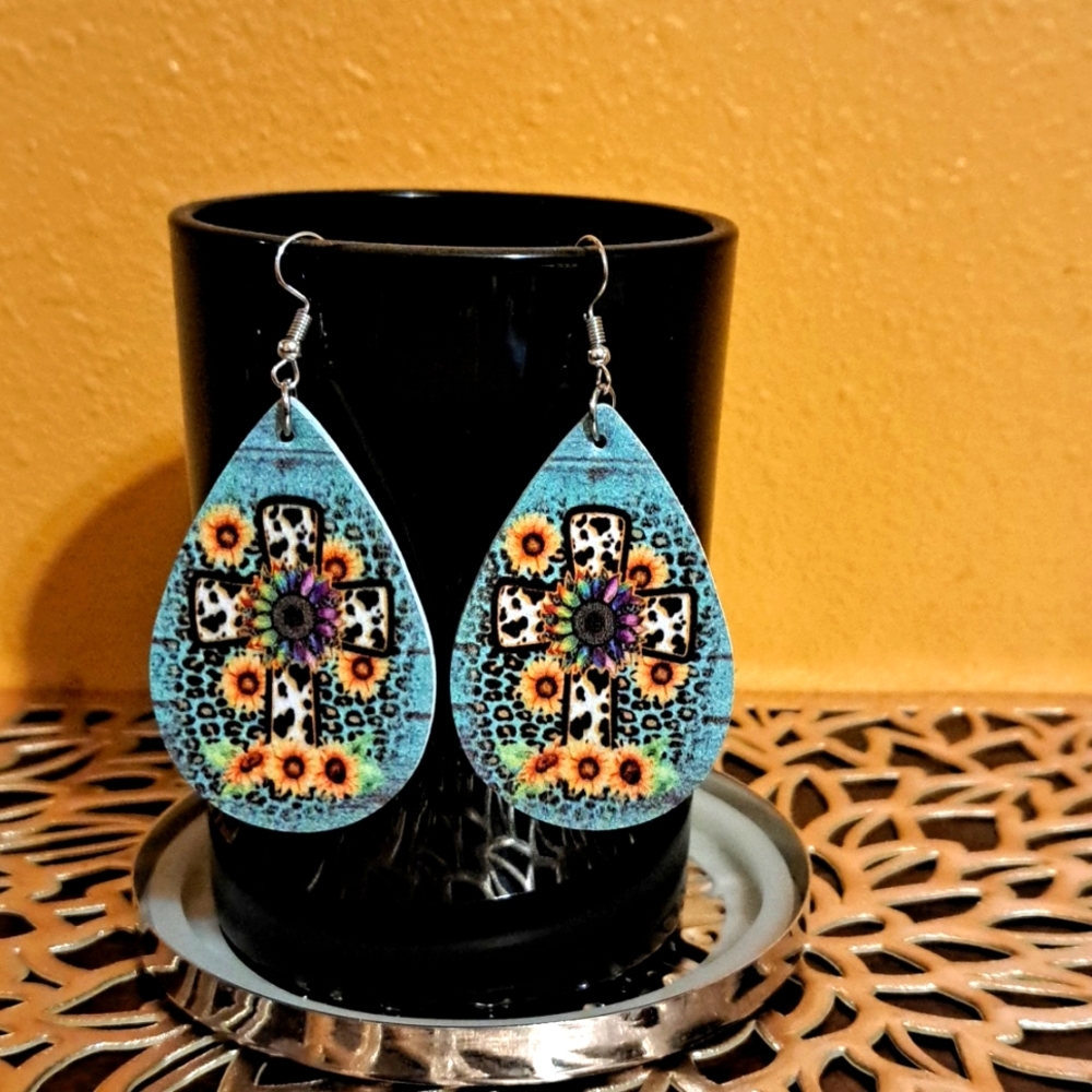 NWT Sunflower cross drop earrings